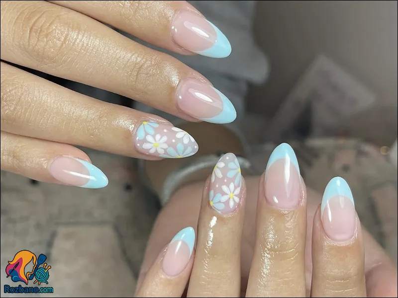 طراحی مدل ناخن جدید و شیک - فرنچ تیپ بهاری با گل های رنگارنگ