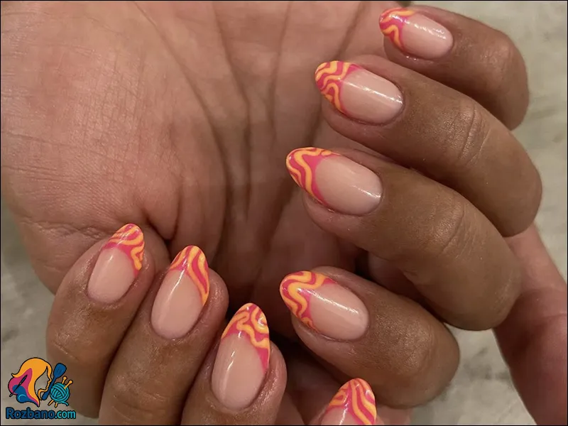 طراحی مدل ناخن جدید و شیک - فرنچ طرحدار موجی با رنگ های قرمز و نارنجی