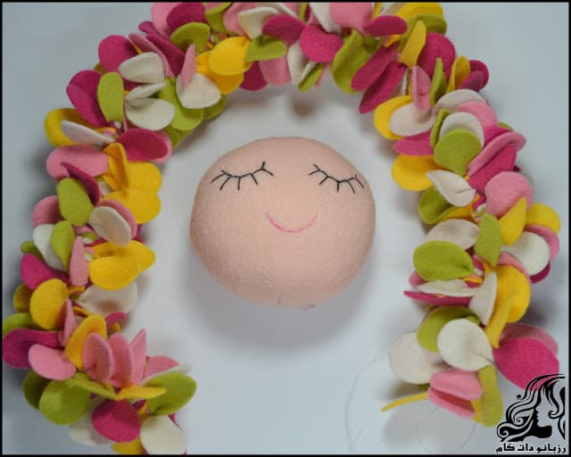 https://up.rozbano.com/view/3134063/Learn%20how%20to%20make%20a%20felt%20girl%20doll-46.jpg