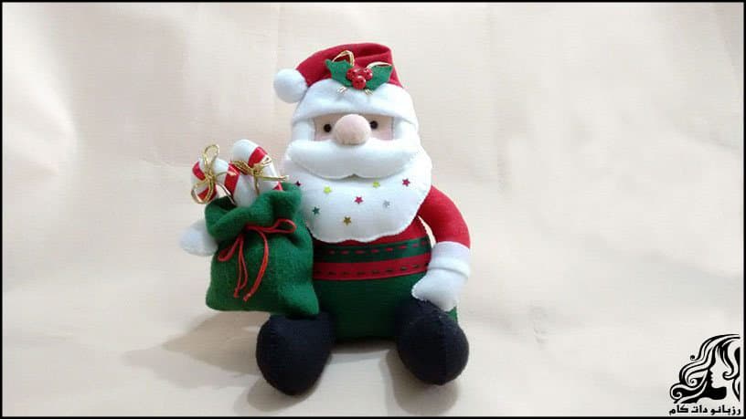 https://up.rozbano.com/view/2934606/Santa%20Claus%20sitting%20Doll.jpg